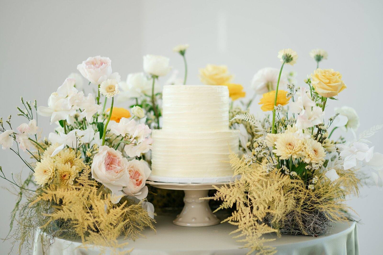 Cake and garden flowers in the ballroom