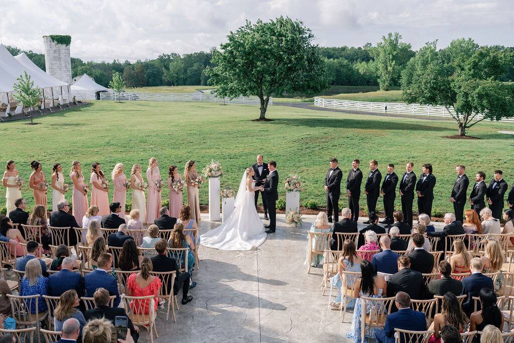 A wedding ceremony on the lower terrace at Northfield Estate